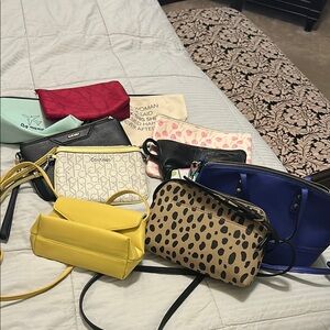 Bundle of shoulder, wristlets and makeup bags